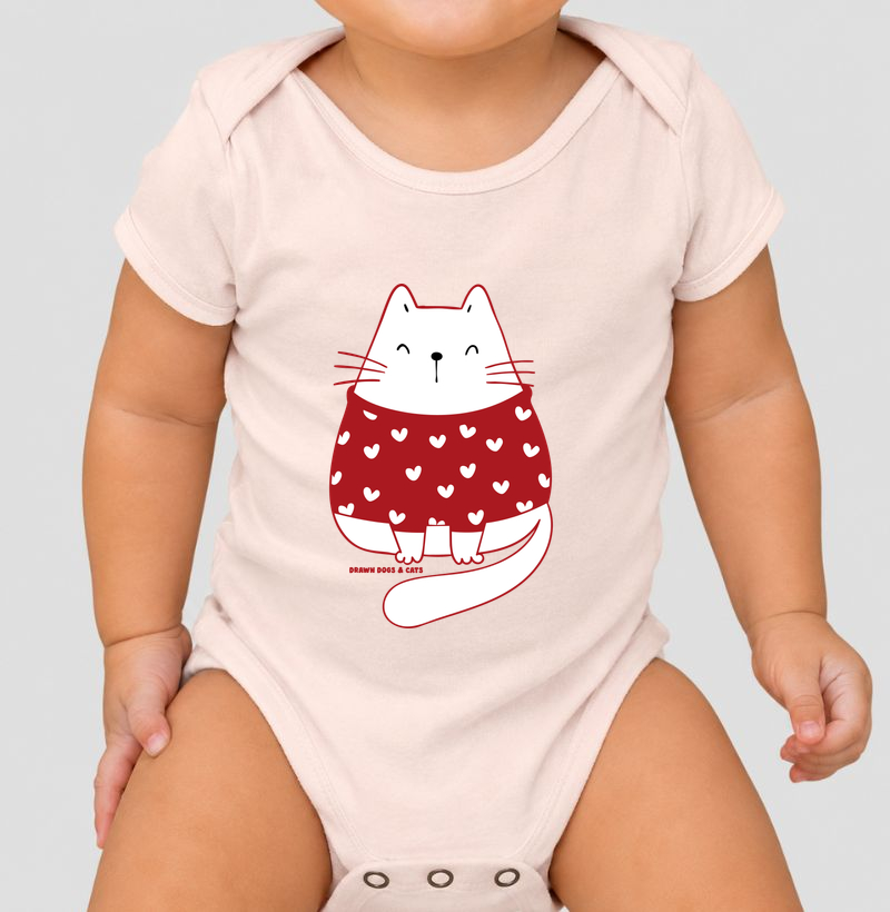 Gata branca de suéter vermelho