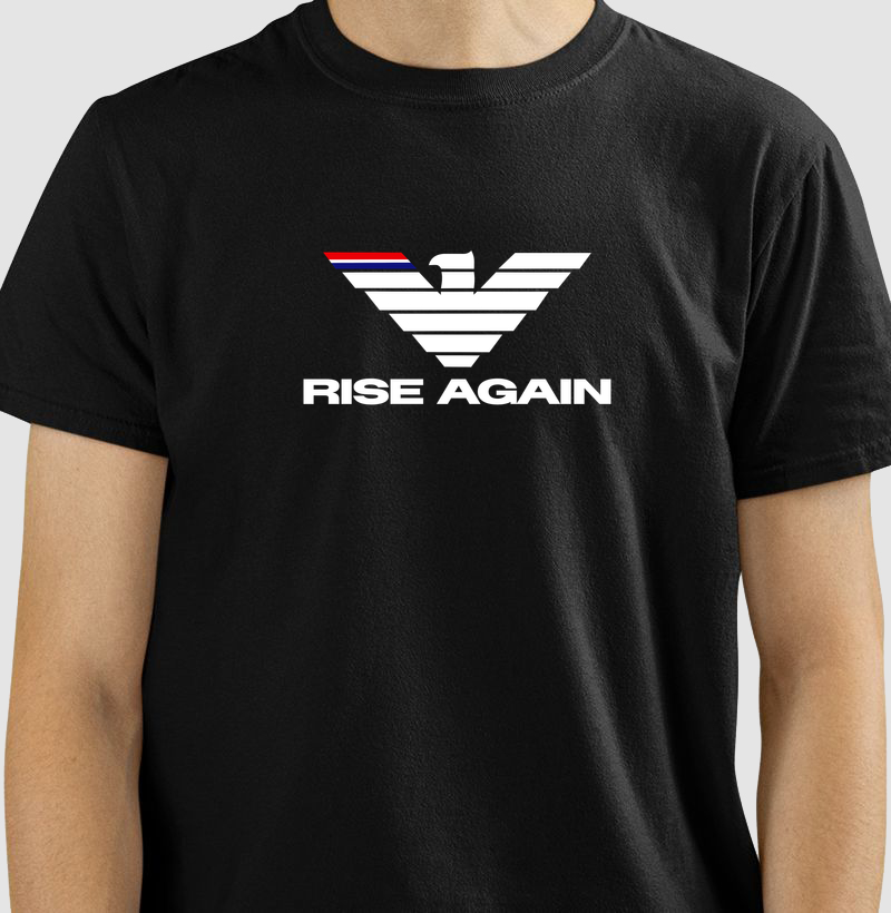 A estampa "Rise Again" é a representação visual da força de quem nunca desiste. Com uma águia estilizada de traços marcantes e design moderno, a arte simboliza poder, foco e a capacidade de se reerguer mais forte após cada batalha. - Camiseta
