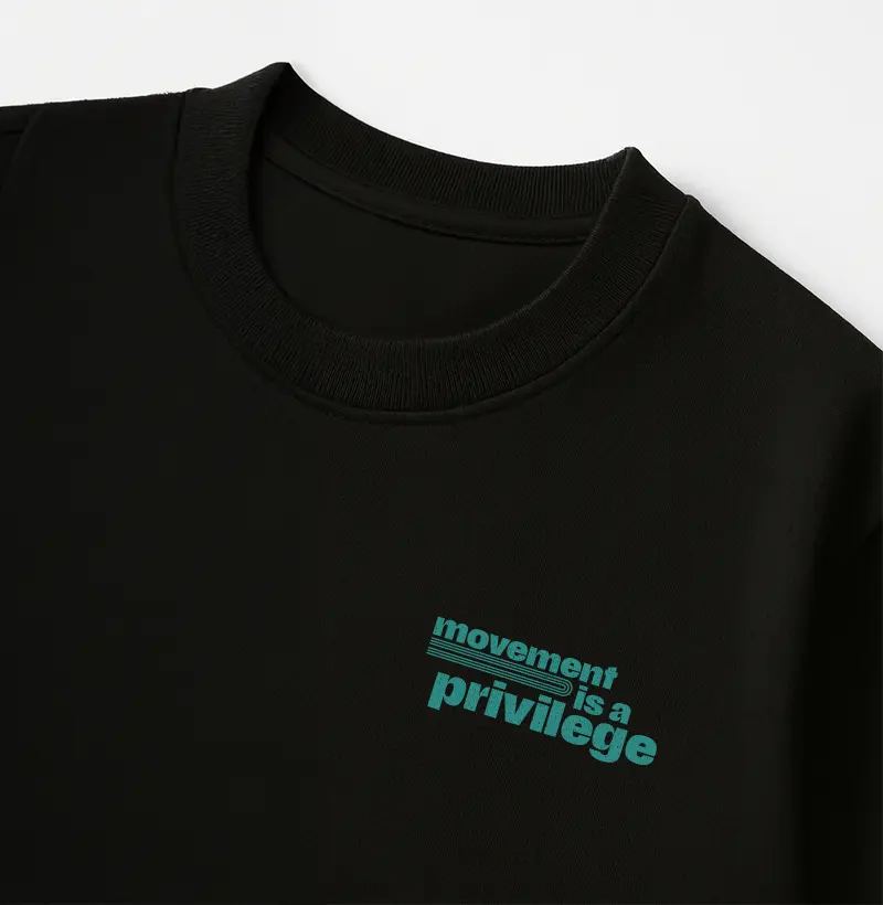 Camiseta Oversized Feminina 100% algodão "movement is a privilege" 