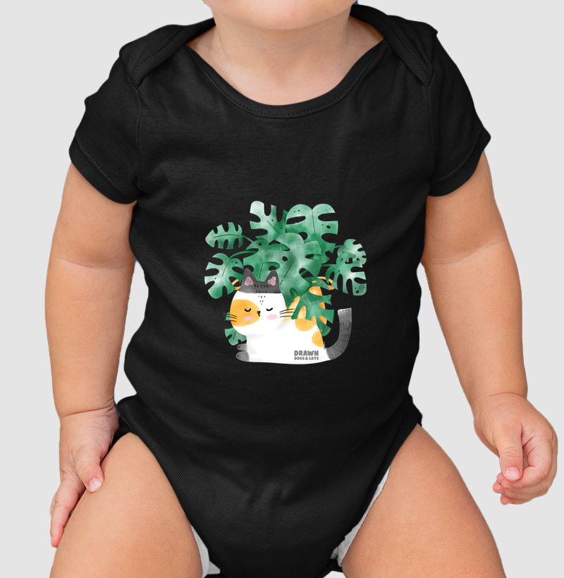 Gatinho branco e folhas de costela de Adão