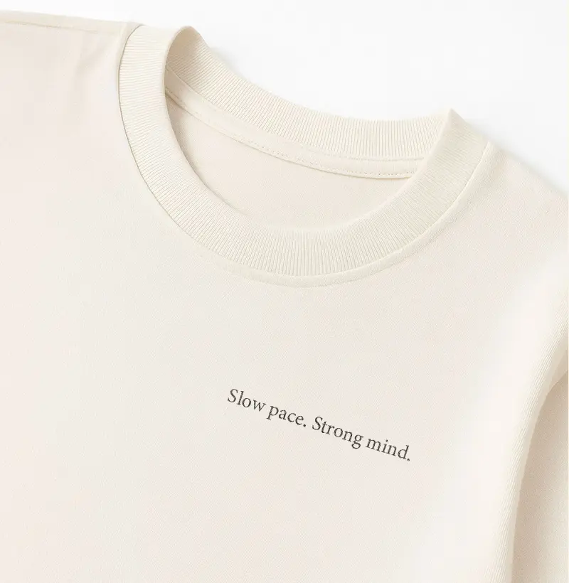 Camiseta Oversized Feminina 100% algodão "Slow pace. Strong mind." 