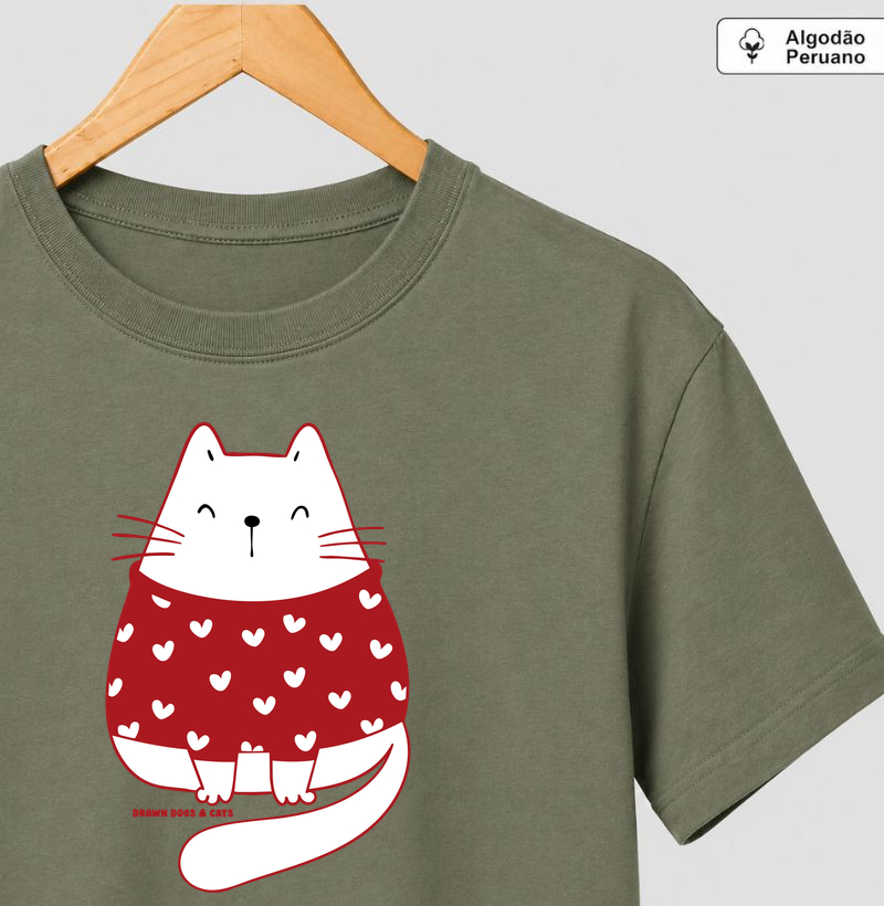 Gata branca de suéter vermelho