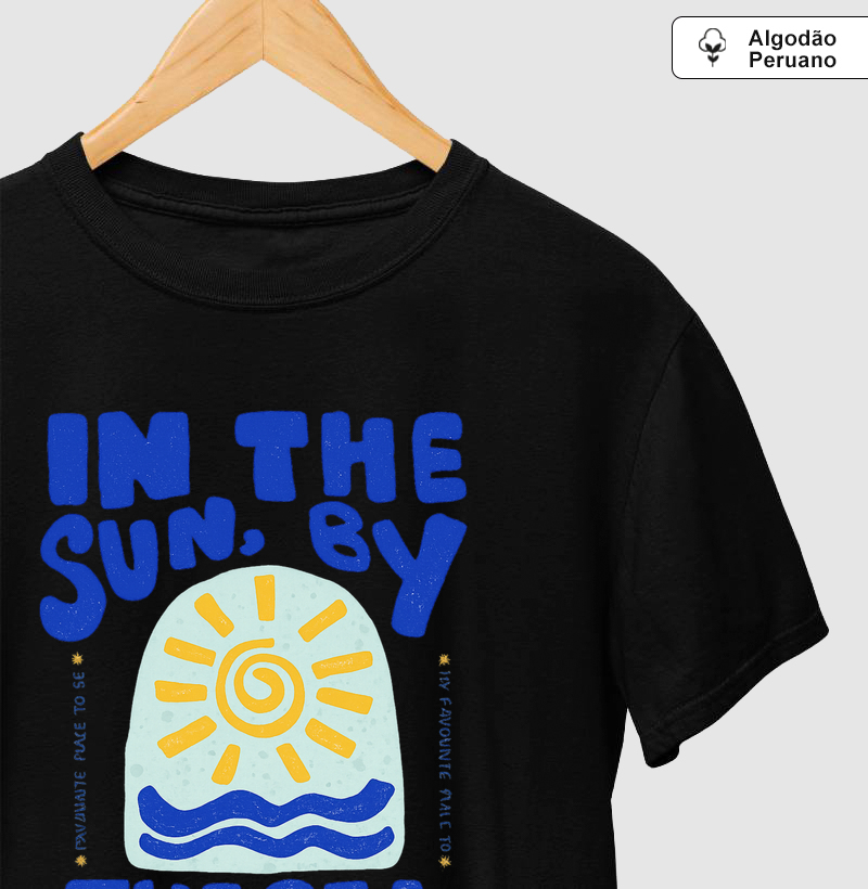 In the sun, by the sea