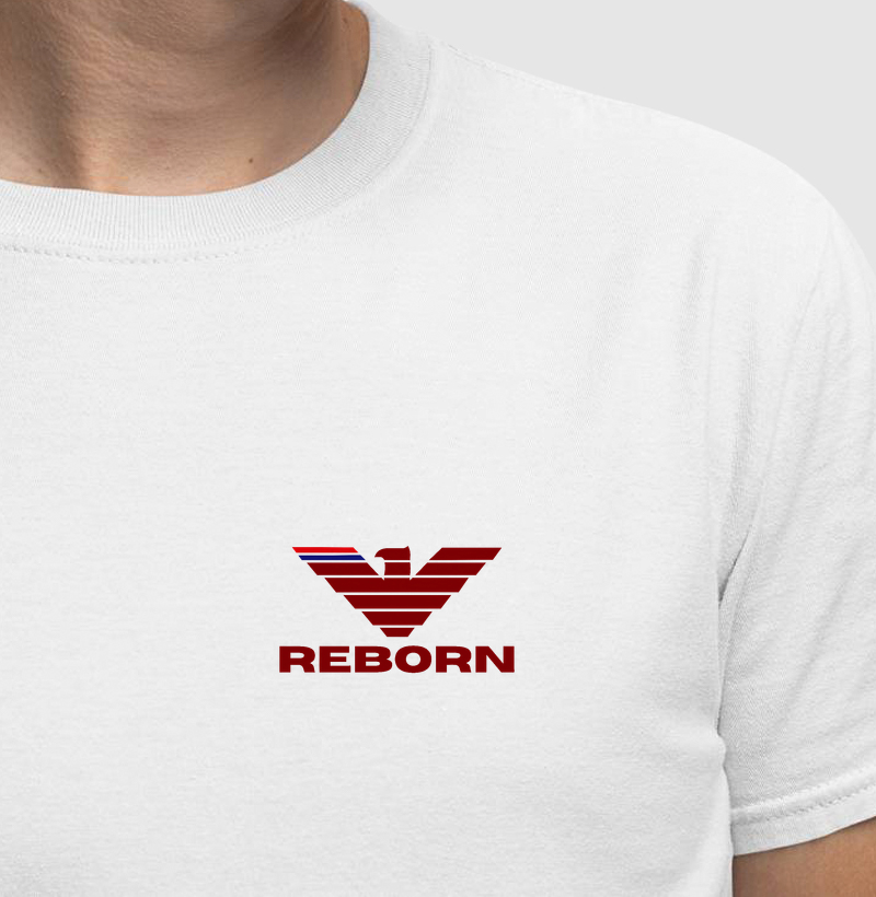 A estampa REBORN celebra o poder do renascimento. Inspirada na águia, símbolo universal de força, visão e liberdade, esta arte representa aqueles que se recusam a ser definidos pelas quedas e escolhem escrever uma nova história a cada desafio - Camiseta