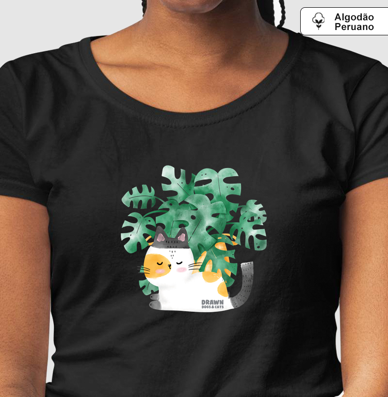 Gatinho branco e folhas de costela de Adão