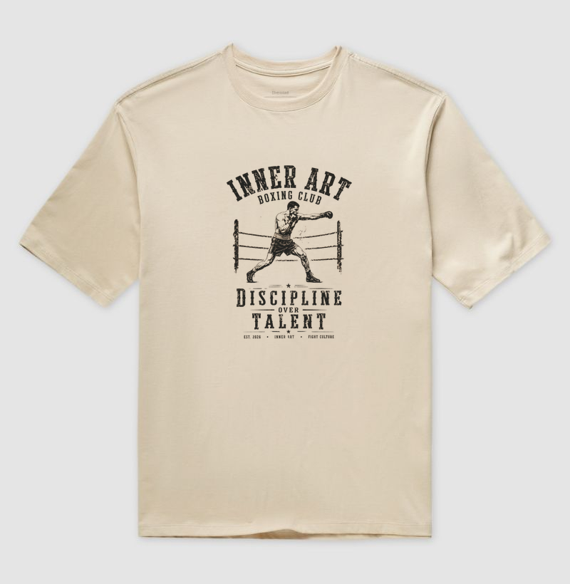 Camiseta masculina oversized Discipline over talent