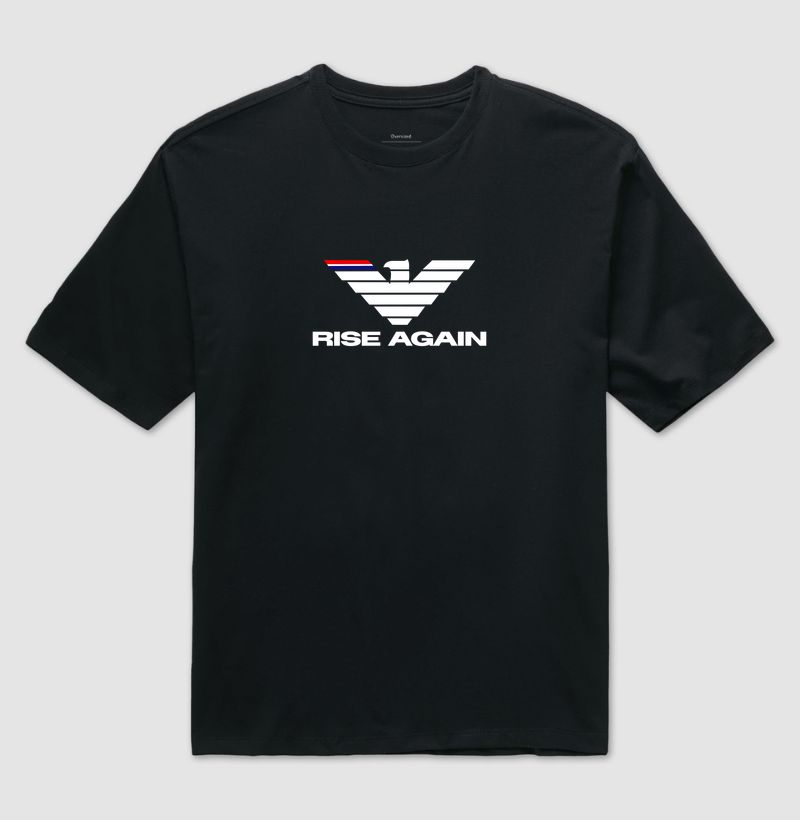 A estampa "Rise Again" é a representação visual da força de quem nunca desiste. Com uma águia estilizada de traços marcantes e design moderno, a arte simboliza poder, foco e a capacidade de se reerguer mais forte após cada batalha. - Camiseta Oversized
